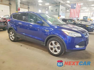 Czwarte zdjęcie samochodu z boku: 2015 FORD ESCAPE SE VIN:1FMCU9GX0FUC57908 - miniatura
