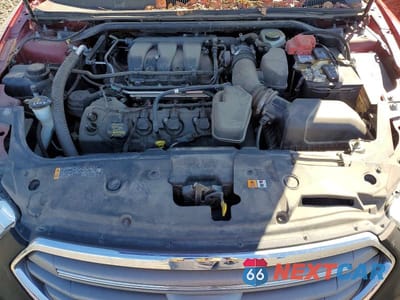 Zdjęcie 11 z 11 samochodu: 2013 FORD TAURUS SEL VIN:1FAHP2H84DG233743 - miniatura