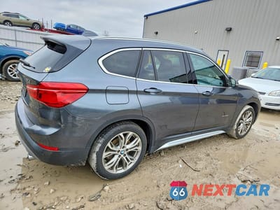 Trzecie zdjęcie samochodu z tyłu: 2017 BMW X1 XDRIVE28I VIN:WBXHT3C34H5F76017 - miniatura
