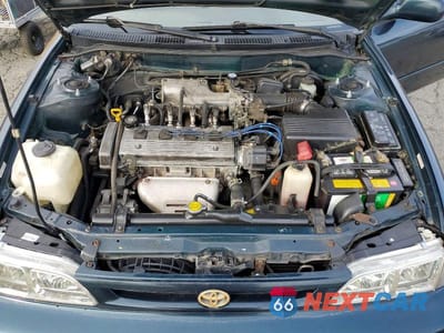 Zdjęcie 11 z 12 samochodu: 1997 TOYOTA COROLLA DX VIN:1NXBB02E5VZ588419 - miniatura