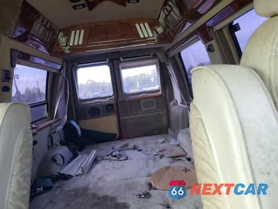 Zdjęcie 10 z 13 samochodu: 1999 FORD ECONOLINE E150 VAN VIN:1FDRE14W0XHB73084 - miniatura
