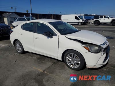 Czwarte zdjęcie samochodu z boku: 2016 SCION IA BASE VIN:3MYDLBZV3GY105622 - miniatura