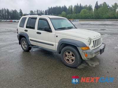 Czwarte zdjęcie samochodu z boku: 2005 JEEP LIBERTY SPORT VIN:1J4GL48K25W522811 - miniatura