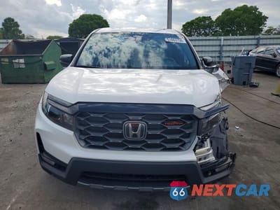Piąte zdjęcie samochodu w środku: 2024 HONDA RIDGELINE TRAIL SPORT VIN:5FPYK3F69RB030937 - miniatura