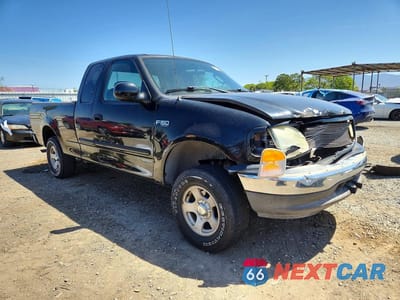 Czwarte zdjęcie samochodu z boku: 2003 FORD F150 VIN:1FTRX17283NA89923 - miniatura