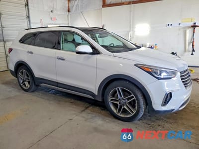 Czwarte zdjęcie samochodu z boku: 2017 HYUNDAI SANTA FE LIMITED ULTIMATE VIN:KM8SRDHF0HU170602 - miniatura