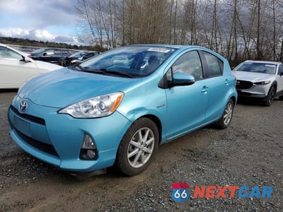 2014 TOYOTA PRIUS C FOUR JTDKDTB38E1067338 - główne zdjęcie licytacji z USA - miniatura