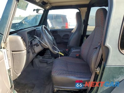 Zdjęcie 7 z 12 samochodu: 2000 JEEP WRANGLER / TJ SPORT VIN:1J4FA49S9YP721689 - miniatura