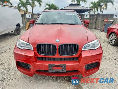 Piąte zdjęcie samochodu w środku: 2013 BMW X5 M VIN:5YMGY0C59D0C11700 - miniatura