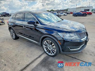 Czwarte zdjęcie samochodu z boku: 2016 LINCOLN MKX RESERVE VIN:2LMPJ6LP9GBL75322 - miniatura