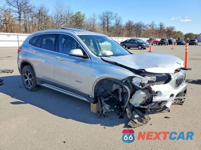 Czwarte zdjęcie samochodu z boku: 2018 BMW X1 XDRIVE28I VIN:WBXHT3C3XJ5K32002 - miniatura