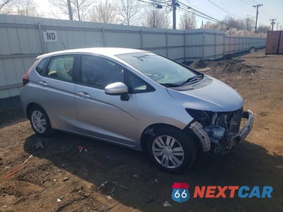 Czwarte zdjęcie samochodu z boku: 2016 HONDA FIT LX VIN:JHMGK5H5XGX013456 - miniatura