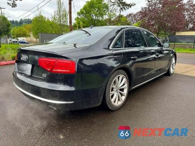 Czwarte zdjęcie samochodu z boku: 2011 AUDI A8 L QUATTRO VIN:WAURVAFD2BN024120 - miniatura