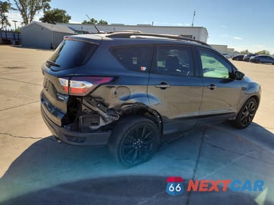 Trzecie zdjęcie samochodu z tyłu: 2017 FORD ESCAPE TITANIUM VIN:1FMCU0J93HUC67275 - miniatura