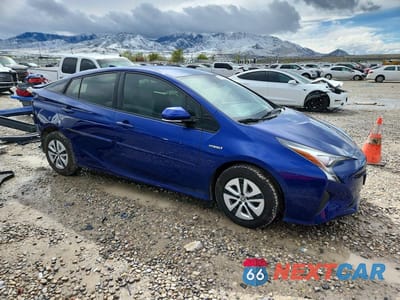 Czwarte zdjęcie samochodu z boku: 2017 TOYOTA PRIUS TWO ECO VIN:JTDKARFU3H3048171 - miniatura