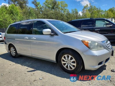 Czwarte zdjęcie samochodu z boku: 2010 HONDA ODYSSEY EXL VIN:5FNRL3H77AB105588 - miniatura