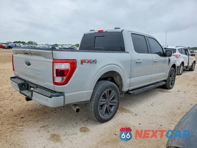 Trzecie zdjęcie samochodu z tyłu: 2023 FORD F150 SUPERCREW VIN:1FTFW1E56PKE06785 - miniatura