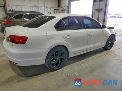 Trzecie zdjęcie samochodu z tyłu: 2012 VOLKSWAGEN JETTA BASE VIN:3VW2K7AJ1CM387692 - miniatura
