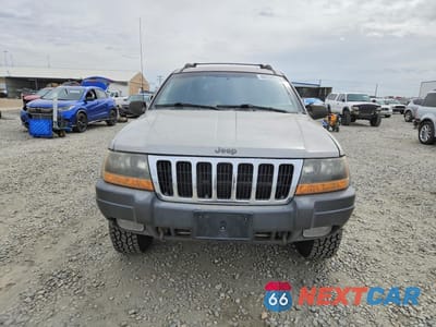 Piąte zdjęcie samochodu w środku: 2001 JEEP GRAND CHEROKEE LAREDO VIN:1J4GW48N51C561695 - miniatura