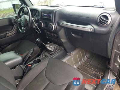 Zdjęcie 8 z 13 samochodu: 2016 JEEP WRANGLER SPORT VIN:1C4AJWAG8GL261658 - miniatura