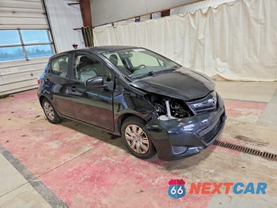 Czwarte zdjęcie samochodu z boku: 2014 TOYOTA YARIS 5-DOOR LE VIN:JTDKTUD33ED579805 - miniatura