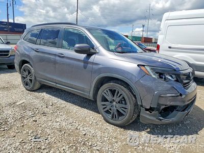 Czwarte zdjęcie samochodu z boku: 2021 HONDA PILOT SE VIN:5FNYF6H23MB036296 - miniatura