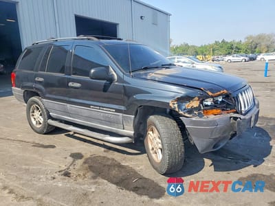 Czwarte zdjęcie samochodu z boku: 2004 JEEP GRAND CHEROKEE LAREDO VIN:1J4GW48S64C127375 - miniatura