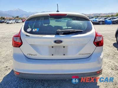 Zdjęcie 6 z 11 samochodu: 2012 FORD FOCUS TITANIUM VIN:1FAHP3N26CL257926 - miniatura