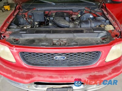 Zdjęcie 11 z 12 samochodu: 1998 FORD F150 VIN:1FTZF08W5WKB66073 - miniatura