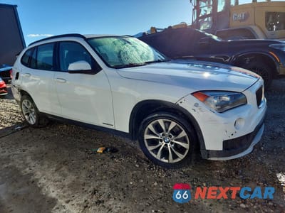 Czwarte zdjęcie samochodu z boku: 2013 BMW X1 XDRIVE28I VIN:WBAVL1C59DVR82904 - miniatura