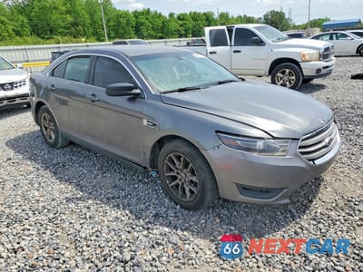Czwarte zdjęcie samochodu z boku: 2014 FORD TAURUS SE VIN:1FAHP2D82EG115794 - miniatura