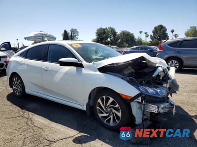 Czwarte zdjęcie samochodu z boku: 2017 HONDA CIVIC EX VIN:2HGFC2F71HH549619 - miniatura