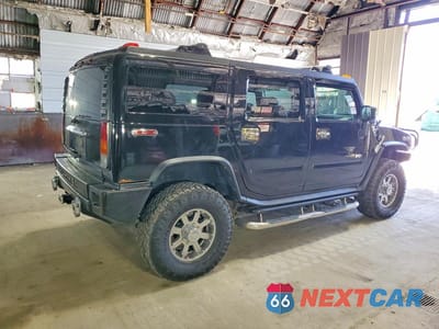 Trzecie zdjęcie samochodu z tyłu: 2004 HUMMER H2 VIN:5GRGN23U74H107367 - miniatura