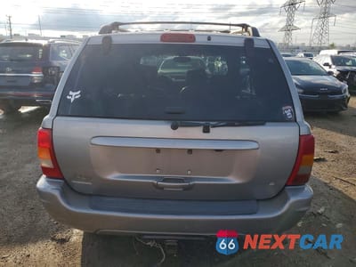 Zdjęcie 6 z 12 samochodu: 2001 JEEP GRAND CHEROKEE LIMITED VIN:1J4GW58N81C525232 - miniatura