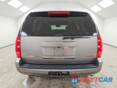 Zdjęcie 6 z 13 samochodu: 2011 GMC YUKON SLE VIN:1GKS2AE00BR273699 - miniatura