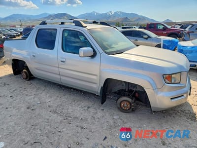 Czwarte zdjęcie samochodu z boku: 2006 HONDA RIDGELINE RTL VIN:2HJYK16506H507132 - miniatura