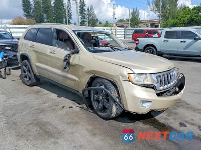 Czwarte zdjęcie samochodu z boku: 2011 JEEP GRAND CHEROKEE OVERLAND VIN:1J4RS6GT8BC626542 - miniatura