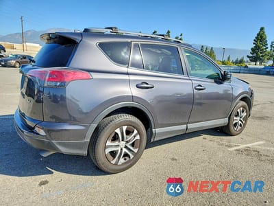 Trzecie zdjęcie samochodu z tyłu: 2017 TOYOTA RAV4 LE VIN:JTMZFREV2HJ108169 - miniatura