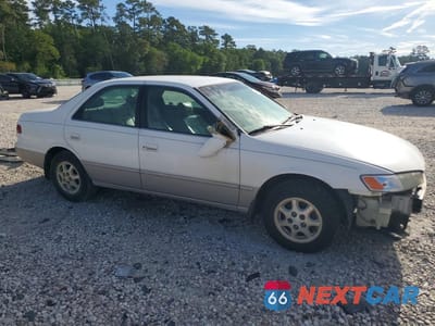 Czwarte zdjęcie samochodu z boku: 1997 TOYOTA CAMRY LE VIN:4T1BG22K3VU150291 - miniatura