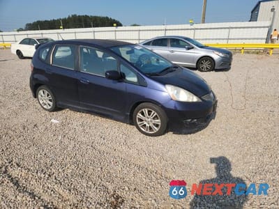 Czwarte zdjęcie samochodu z boku: 2009 HONDA FIT SPORT VIN:JHMGE88479S028111 - miniatura