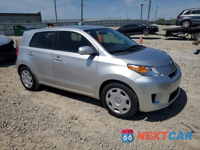 Czwarte zdjęcie samochodu z boku: 2012 SCION XD BASE VIN:JTKKU4B40C1022690 - miniatura