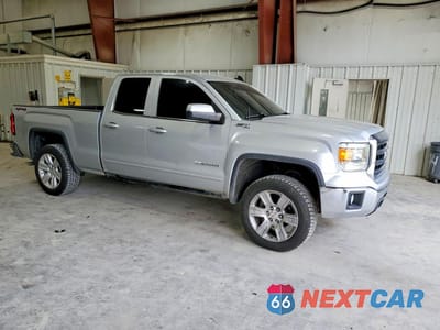 Czwarte zdjęcie samochodu z boku: 2015 GMC SIERRA K1500 SLE VIN:1GTV2UEC1FZ220309 - miniatura