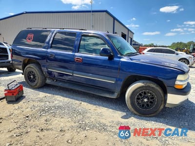 Czwarte zdjęcie samochodu z boku: 2003 CHEVROLET SUBURBAN K1500 VIN:1GNFK16T33J188790 - miniatura