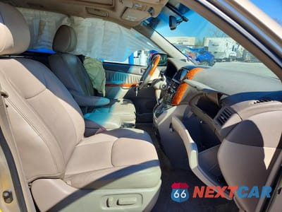 Zdjęcie 7 z 13 samochodu: 2010 TOYOTA SIENNA XLE LIMITED VIN:5TDYK4CC5AS291345 - miniatura