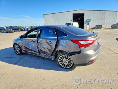 Drugie zdjęcie samochodu z przodu: 2014 FORD FOCUS TITANIUM VIN:1FADP3J23EL224714 - miniatura