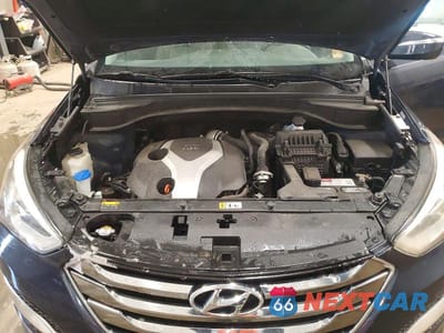 Zdjęcie 12 z 14 samochodu: 2013 HYUNDAI SANTA FE SPORT 2.0T VIN:5XYZU3LA7DG078910 - miniatura