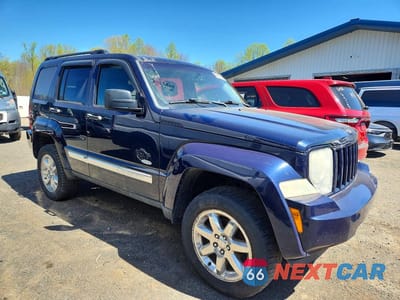 Czwarte zdjęcie samochodu z boku: 2012 JEEP LIBERTY SPORT VIN:1C4PJMAK5CW176644 - miniatura