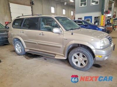 Czwarte zdjęcie samochodu z boku: 2003 SUZUKI XL7 PLUS VIN:JS3TX92V334104938 - miniatura