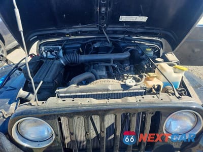 Zdjęcie 11 z 12 samochodu: 2000 JEEP WRANGLER / TJ SPORT VIN:1J4FA49S7YP778103 - miniatura