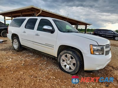Czwarte zdjęcie samochodu z boku: 2013 CHEVROLET SUBURBAN K1500 LTZ VIN:1GNSKKE79DR166448 - miniatura